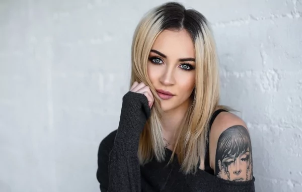 Stylish blonde with a tattoo